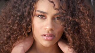 Black model beauty Scarlit Scandal in a super sexy striptease for Playboy