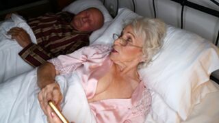 70+ old woman fucking much younger dick while her hubby is sleeping!