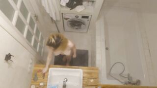 My nude GF bathing in total disregard of my filming