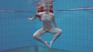 Beautiful Polish teen Alice swimming without clothes on
