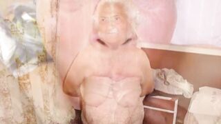 Grandma squeezes her giant breasts with big nipples