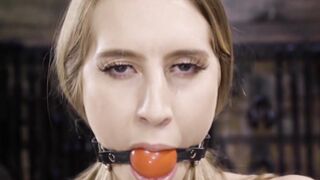 Blonde experiences machine fucking in a rope bondage